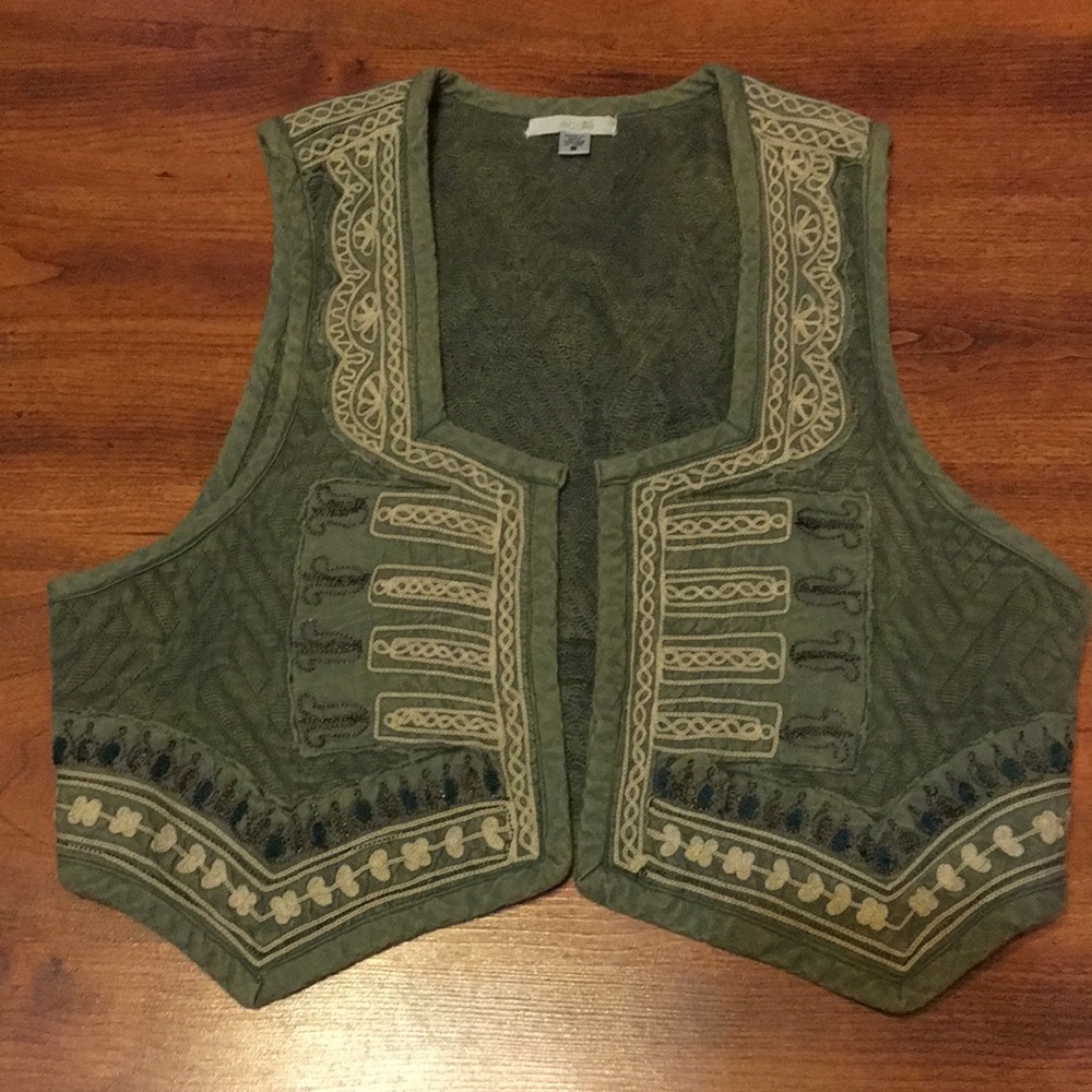 Girls size S adorable green boho vest.
